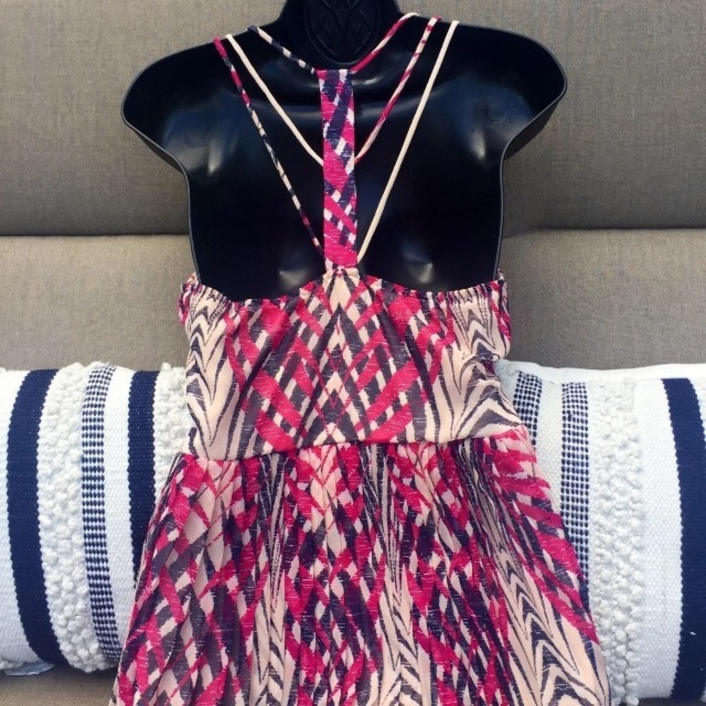 AKIKO Top with Strappy Back & Pleated Peplum